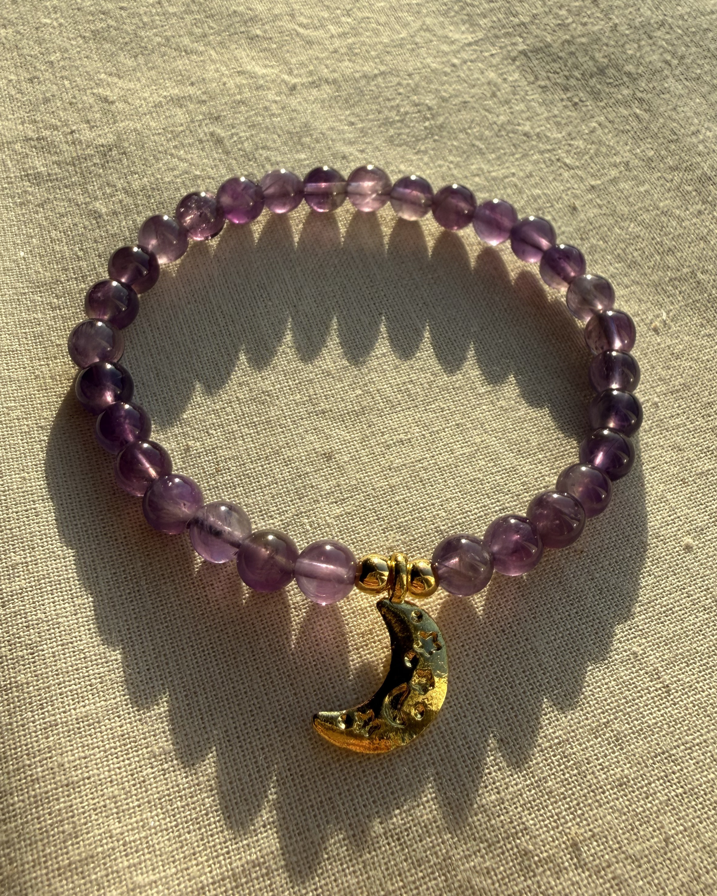 Amethist armband maanbedel